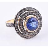 A tanzanite and diamond cluster dress ring