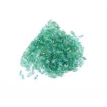 † A packet of marquise cut emeralds