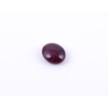 † An oval cabochon ruby