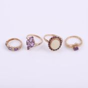 A 9 carat gold amethyst and opal cluster dress ring