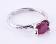 A synthetic ruby single stone ring