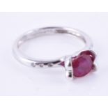 A synthetic ruby single stone ring