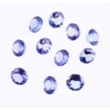 † Eleven unmounted circular cut tanzanite