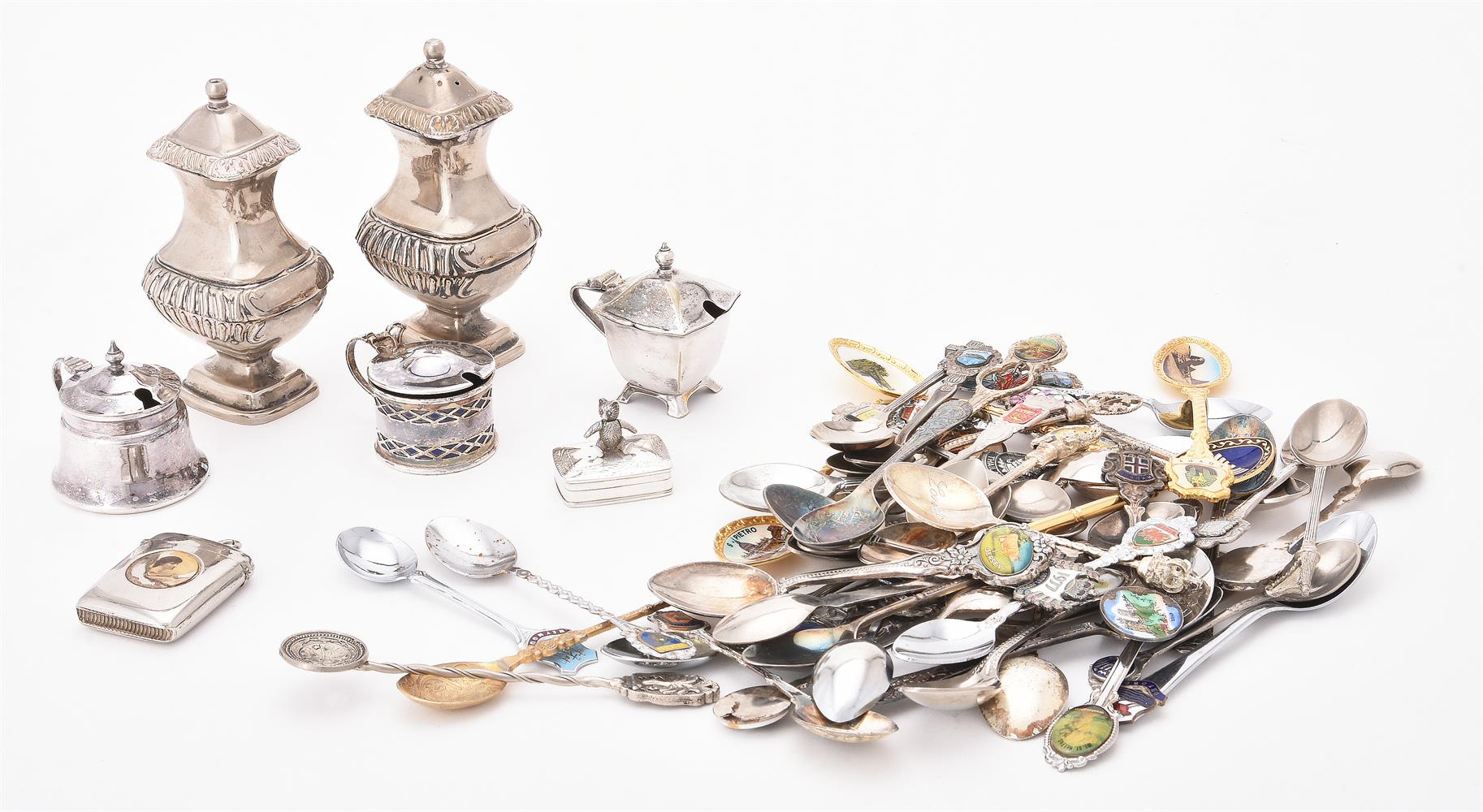 A collection of electro-plated souvenir spoons and other items