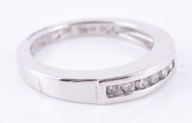 A diamond band ring