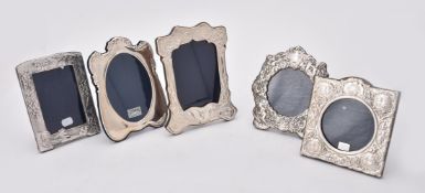 Four silver mounted photo frames by Ray Hall