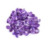 † A packet of mixed cut amethysts