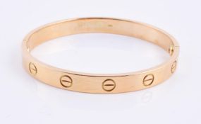 A two section gold coloured bangle
