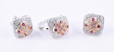 A ruby, diamond and pink sapphire ring and earring suite