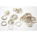 A collection of silver and silver coloured bangles