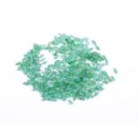 † A packet of marquise cut emeralds