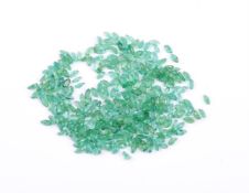 † A packet of marquise cut emeralds