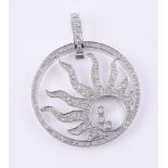 A diamond rising sun pendant