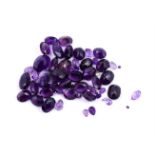 † A packet of mixed cut amethysts