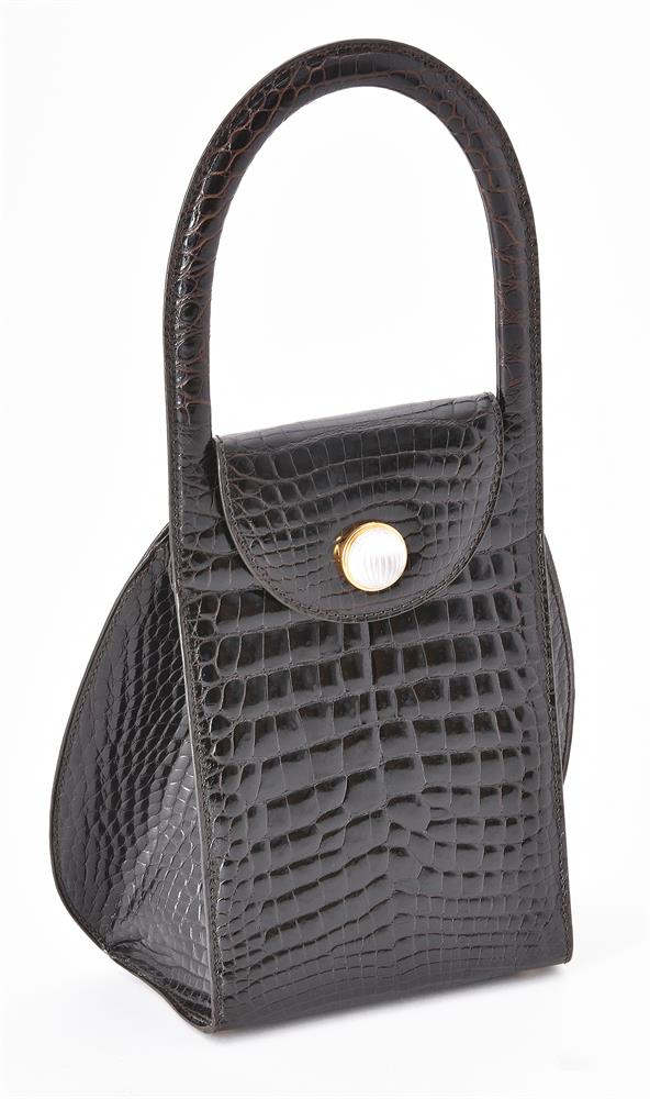 Y Lalique, a black/brown crocodile handbag