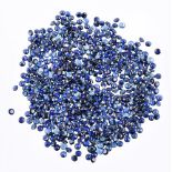 † A packet of circular cut sapphires