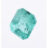 † An unmounted step cut emerald