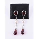 A pair of garnet, cultured pearl and diamond drop earrings