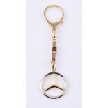 An Italian three colour gold key ring and fob
