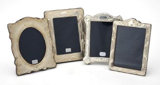 Four silver mounted photo frames by Ray Hall