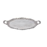 An electro-plated twin handled shaped oval tray