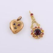 A garnet set flower pendant