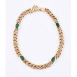 An 18 carat yellow gold and emerald bracelet