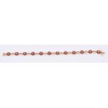 A ruby and diamond flowerhead cluster bracelet