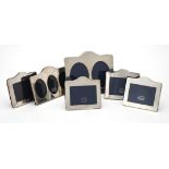 Six silver mounted shaped rectangular photo frames