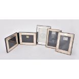 Four silver mounted photo frames