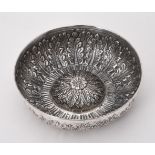 An Islamic silver coloured bowl