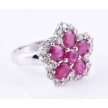 A ruby and diamond cluster ring