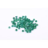 † A parcel of circular cabochon emeralds