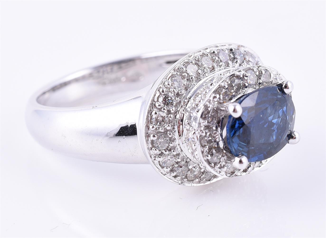 A sapphire and diamond dress ring