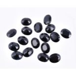 † A packet of oval cut sapphires