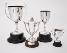A silver twin handled trophy cup and cover by Boodle & Dunthorne