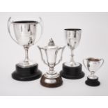 A silver twin handled trophy cup and cover by Boodle & Dunthorne