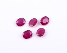 † Five oval cut synthetic rubies