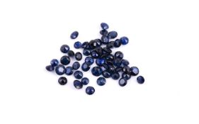 † A packet of unmounted circular cut sapphires