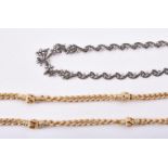 A gilt curb link chain by Grosse