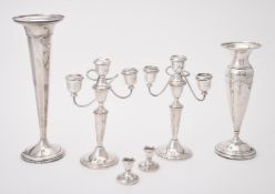A pair of American silver coloured three light candelabra by Gorham