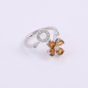 A citrine and diamond dress ring