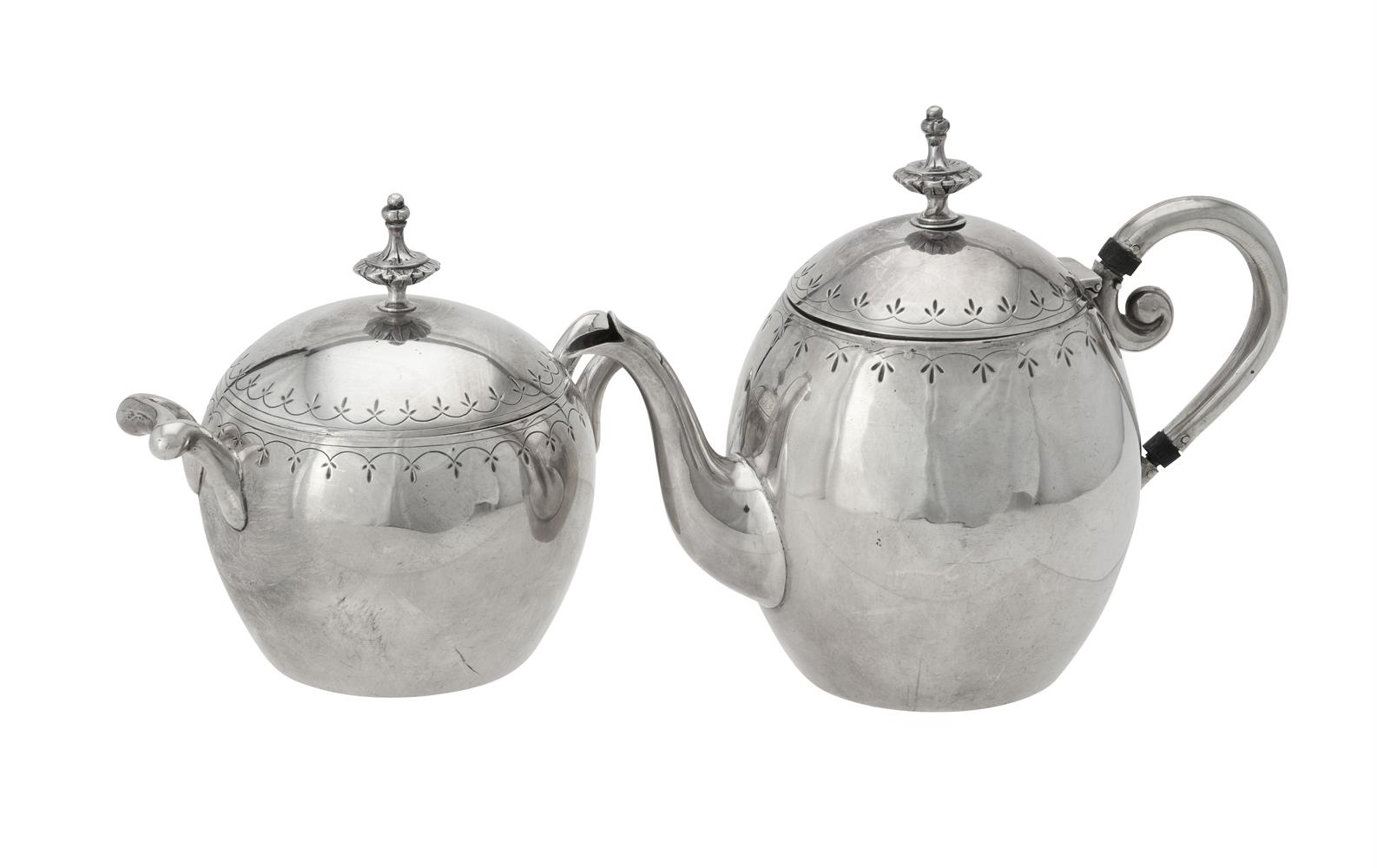 A Dutch silver circular bachelors tea pot and sugar bowl