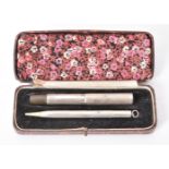 A silver cased fountain pen