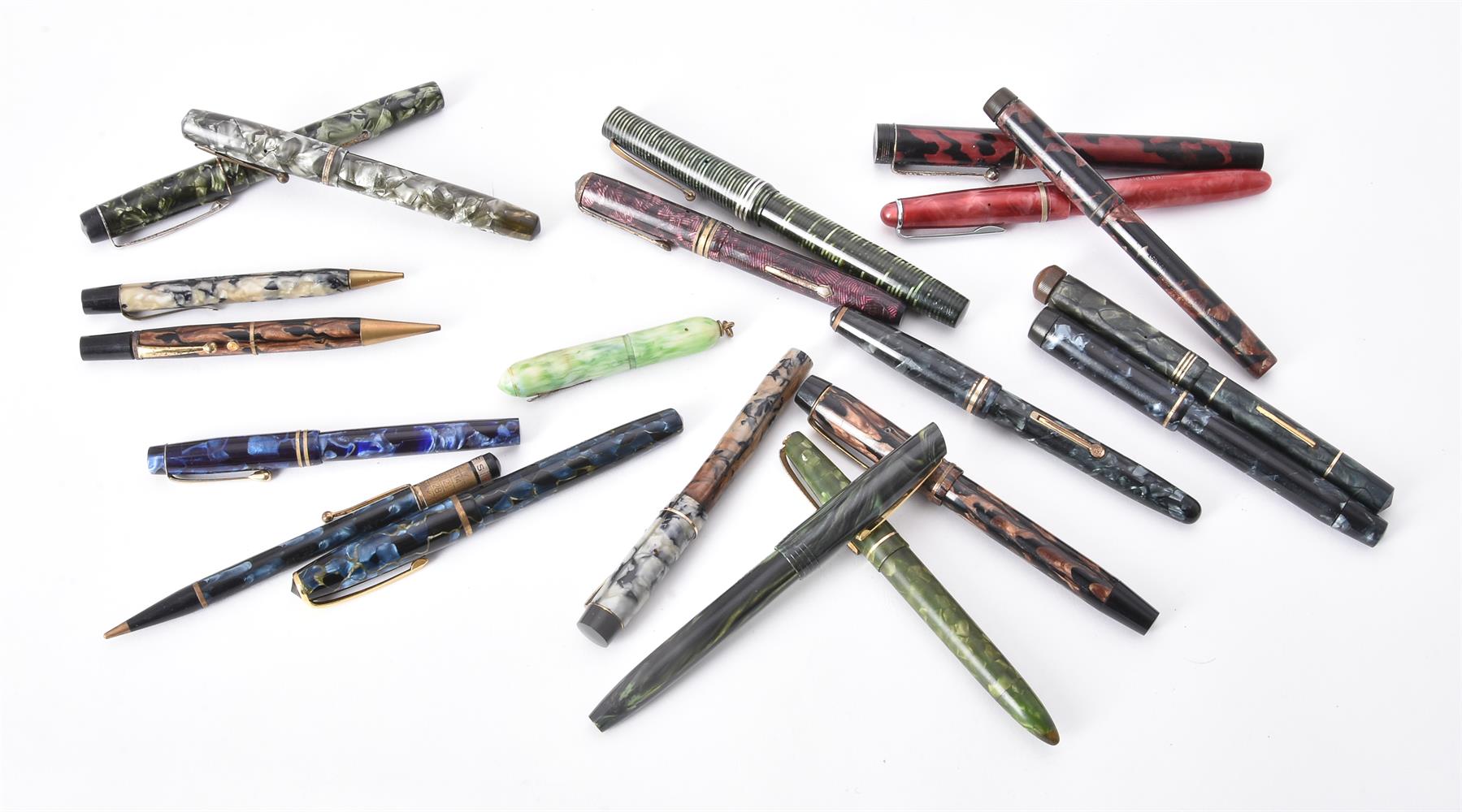 A collection of vintage marbled fountain pens