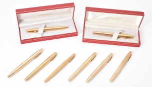 Sheaffer, a collection of eight gold plated pens