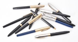 Sheaffer, a collection of eleven fountain pens and a ballpoint pen