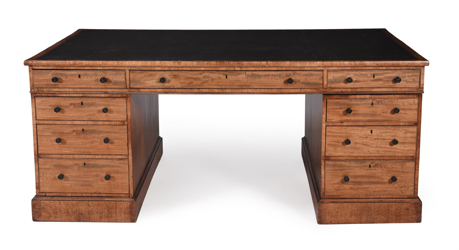 A Regency mahogany twin pedestal partner's desk