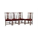 A set of four George III mahogany dining chairs