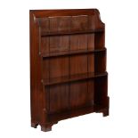 A mahogany waterfall bookcase